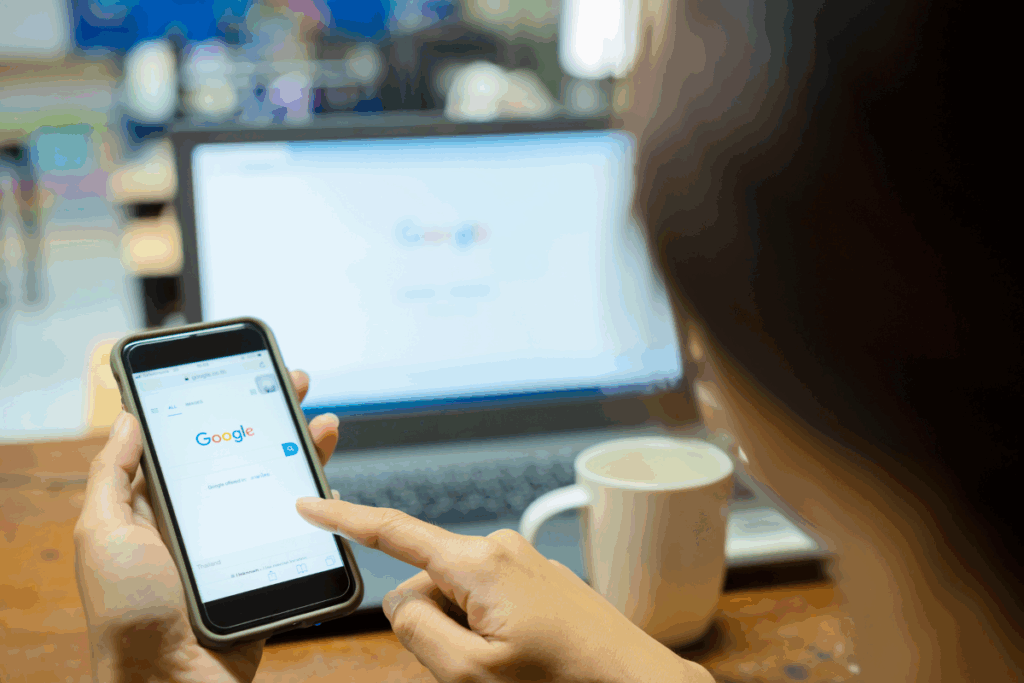 Google ads vs Facebook ads for small businesses: a woman searching on Google mobile